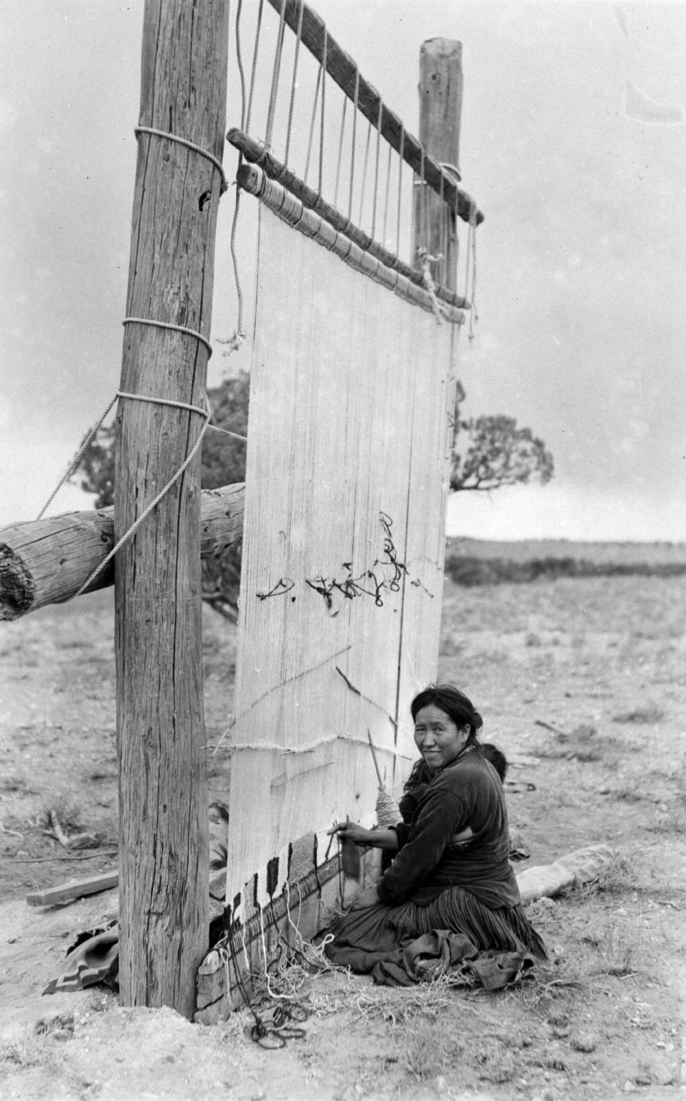      [At Zion National Park, a Navajo woman demonstrates traditional rug weaving techniques, Union Pacific Museum Collection.]     At Zion National Park, a Navajo woman demonstrates traditional rug weaving techniques